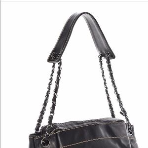 Authentic CHANEL black Lambskin Lax Accordion bag.